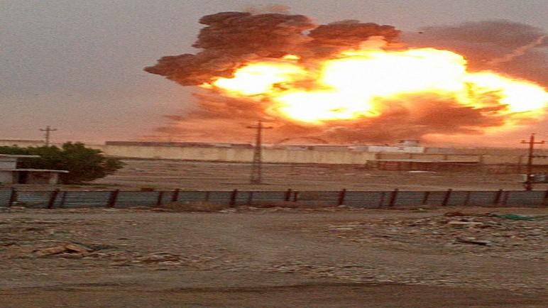 بالصور.. انفجارات تهز معسكر صقر في منطقة الدورة جنوبي بغداد
